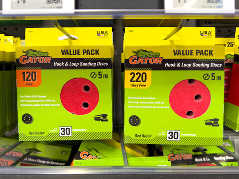 Frisco, Texas, USA - September 15th, 2026: Gator Hook & Loop Sanding Discs Value Pack packages hanging on retail rack shelf