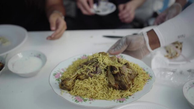 Traditional Arabic Mandi Rice with Tender Lamb Shank Served in Restaurant