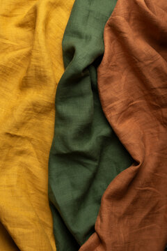 Draped Linen Fabric Texture Macro in Mustard Yellow Olive Green and Terracotta