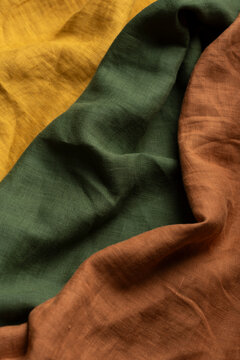 Draped Linen Fabric Texture Macro in Mustard Yellow Olive Green and Terracotta