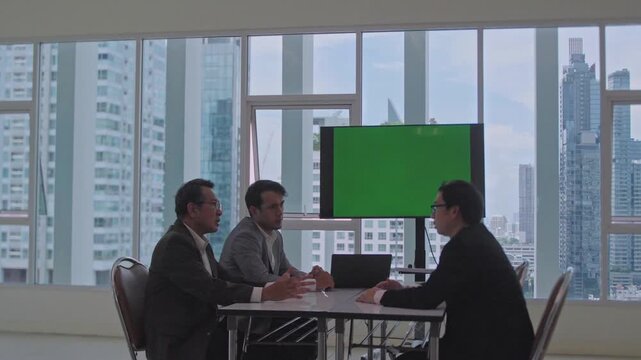 Business Meeting in Modern Office with City Skyline Through Window, Professional Conversation, Teamwork, Entrepreneur Negotiation, and Collaborative Urban Corporate Discussion Among Colleagues