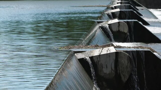 Water Overflowing and Cascading Over River Weir Gate 4K