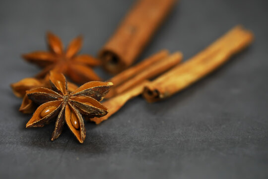 Close-Up of Star Anise and Cinnamon Sticks on Dark Background