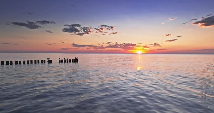 Serene summer sunset along the Baltic in Poland.