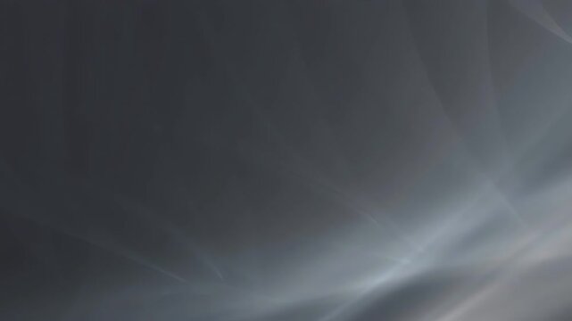Camera orbits around a dark gray color gradient background, emphasizing the dynamic shifts in color and light while maintaining a serene atmosphere throughout