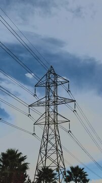 Electrical Transmission Tower Against Blue Sky