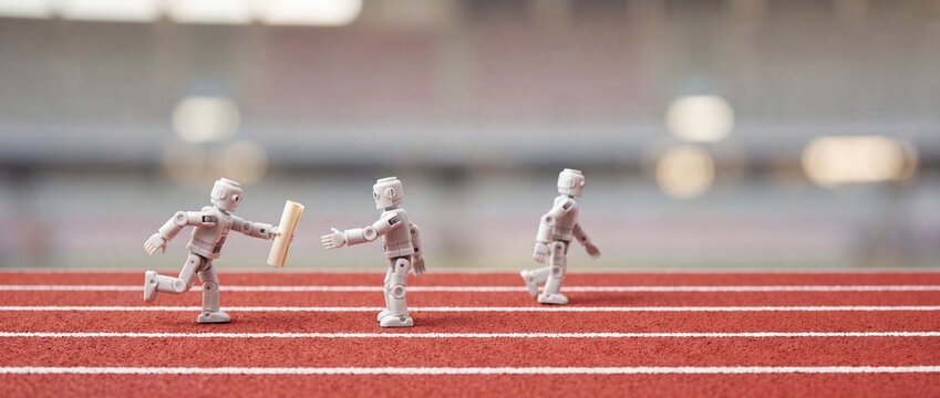 Tiny robots passing baton on running track, AI agents workflow handoff