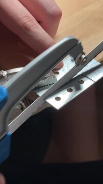 Small saw cutting metal