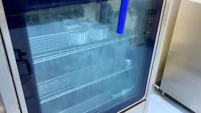 In a hospital, medical staff uses an autoclave machine to sterilize surgical instruments. The staff ensures cleanliness and safety in the operating room. This process happens during the day