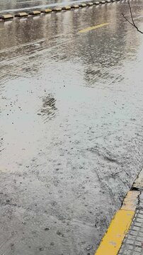 Rain Drops and Water Texture on Pavement