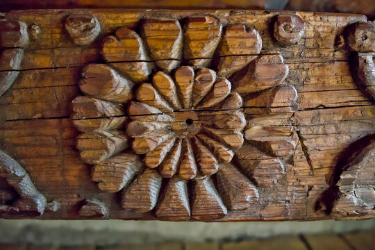 Carved Wooden Floral Rosette Relief Detail on Vintage Timber