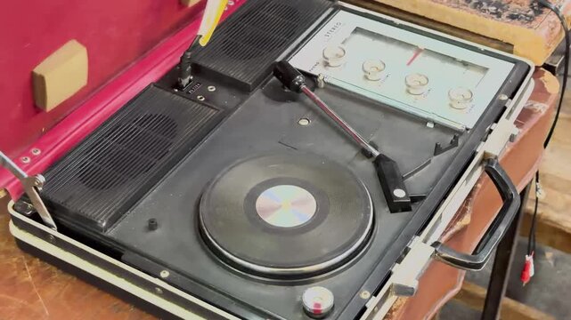 Close-Up of a Vinyl Record Spinning on a Turntable