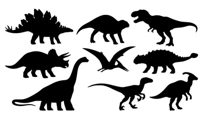 Collection of black dinosaur silhouettes featuring stegosaurus, triceratops, tyrannosaurus, pterosaurs and other prehistoric creatures © Prodip