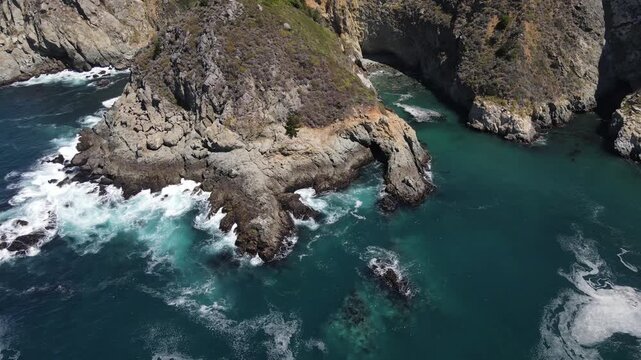 Aerial shot of the rugged coastline along the Pacific Coast Highway in Central California