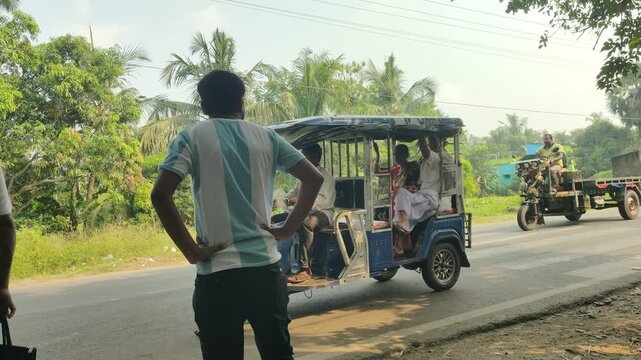 Pedestrians and local villagers safely crossing National Highway 117 in West Bengal