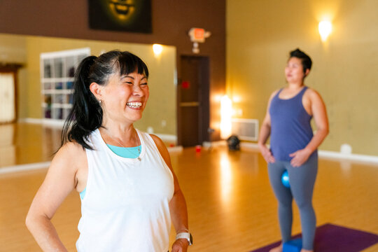 fitness instructor enjoying exercise class