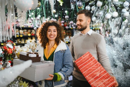Couple shopping for christmas presents holiday season