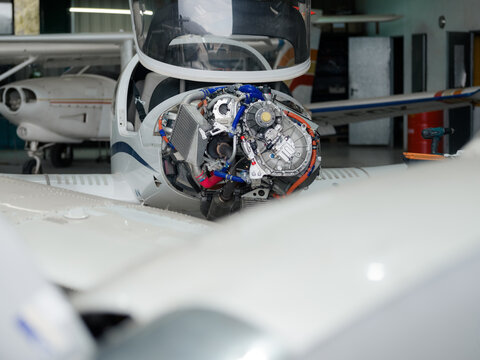 Aircraft Engine is Under Repair in a Hangar