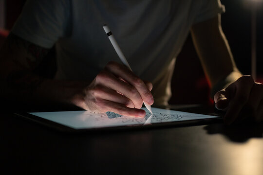 Artist drawing on digital tablet