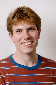 Close-up portrait of a smiling enterprising man looking at the camera.