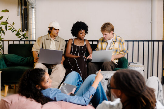 Submitting ideas on teamwork during a creative brainstorming session.