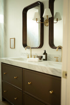 Bathroom With Double Mirrors and Stylish Fixtures