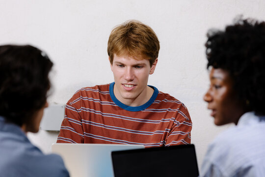 Entrepreneur using a laptop during a meeting