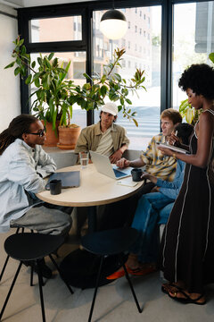 Diverse team of professionals working together in a common area