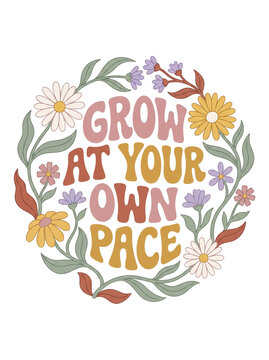 Groovy retro typography quote grow at your own pace surrounded by beautiful spring botanical floral wreath on transparent background