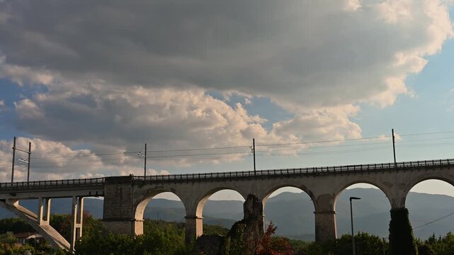 Destroyed in the Allied bombings of 1943, it was rebuilt in its current form. It is supported by two sets of arches separated by a large arch spanning the Carpino River.