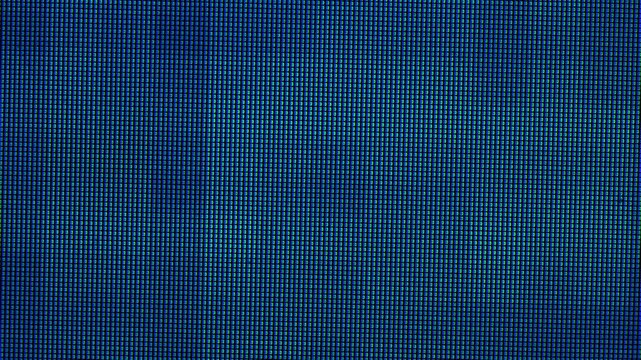 Extreme macro of blue and green RGB subpixels on LCD screen