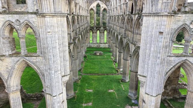 Rievaulx Abbey was a Cistercian abbey in Rievaulx, situated near Helmsley in the North York Moors National Park, North Yorkshire, England