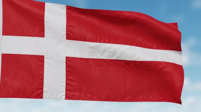 Waving Danish Flag Against Blue Sky