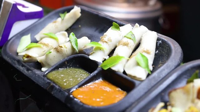 Dal fara made with rice flour filled with dal on a street food stall