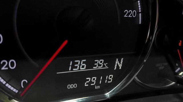 Car dashboard display showing automatic transmission gear changing from reverse mode D, N, R to P
