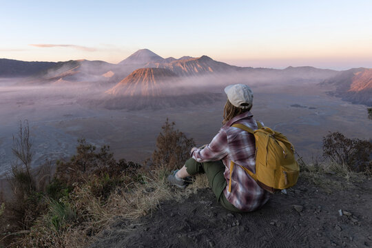 Travelers relax and enjoy the morning scenery at Mount Bromo. Located in Bromo, Tengger, Semeru National Park, East Java, Indonesia.