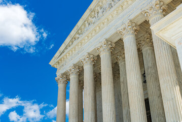 Architectural rhythm of neoclassical columns on landmark government building in Washington DC © kosoff