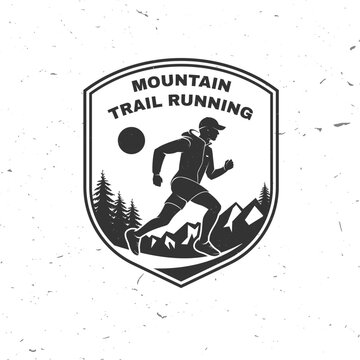 Mountain Trail Running Badge with Athletic Runner, Pine Trees and Rocky Peaks, Vintage Outdoor Adventure Shield Emblem in Distressed Monochrome Style for Hiking, Endurance Sports and Fitness Branding
