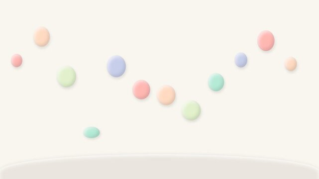 Multiple colorful pastel clay balls bouncing and moving in a wave pattern against a white background.