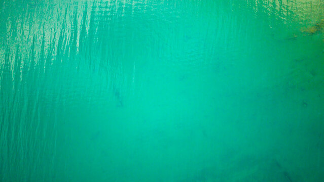 Bruce Penisula National Park, Canada - May 8 2026: A dramatic 4K aerial drone photograph showcasing the rugged limestone cliffs and crystal-clear turquoise waters along the Georgian Bay shoreline near