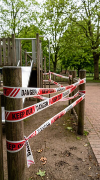 Empty Playground Closed with Danger Keep Out Tape Social Distancing Lockdown Concept