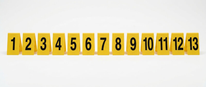 Yellow Number Markers 1 to 13 Lined Up Forensic Evidence or Countdown Concept