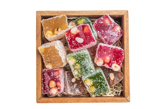 Assorted lokum sweets with nuts and berries . Traditional oriental candy with copy space.