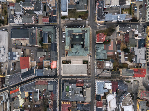 Top-down aerial view of central Jablonec nad Nisou, Liberec Region, Czech Republic, showing streets, rooftops, the New Town Hall and surrounding city blocks.