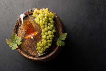 Fototapeta premium Pink wine tasting still life with vineyard harvest