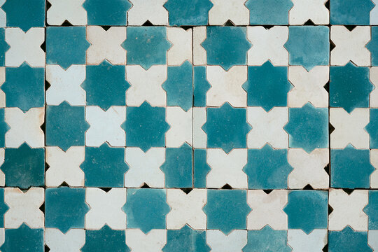 Turquoise and white geometric Islamic mosaic tile texture, traditional ceramic background