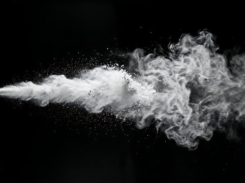 Dynamic white powder explosion isolated on a dark background representing energy motion and abstract artistic particles