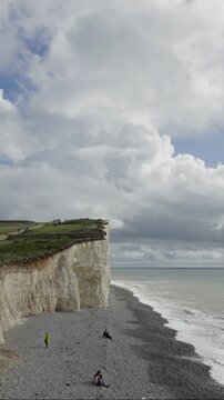 Time-lapse, clouds, waves, Seven Sisters chalk cliffs, Birling Gap near Eastbourne, East Sussex, England, United Kingdom