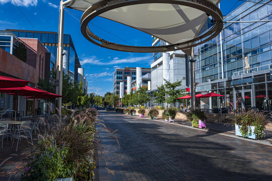 A view of the Cherry Creek Fillmore Plaza under its sun shade canopy which serves many functions including heat and sun protection during the day and a lighting system for nighttime events.
