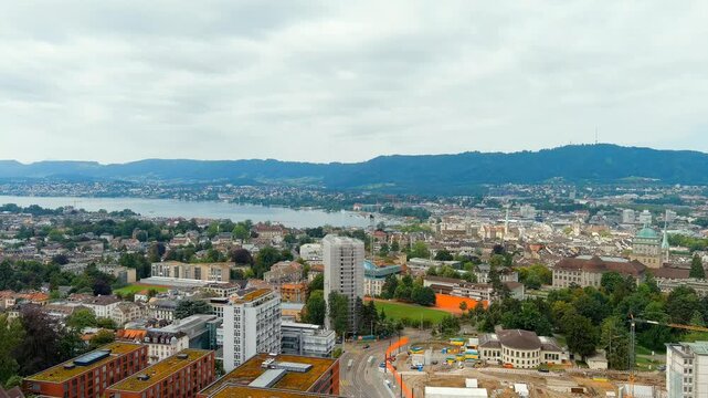 Zurich, Switzerland. Panorama of the city overlooking Lake Zurich. Summer day. Drone footage
